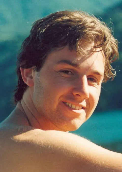 Portrait of Guillermo as a young man, smiling